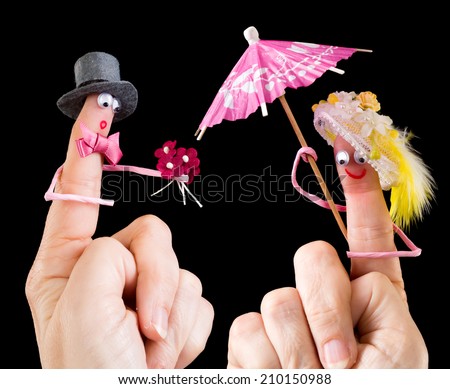 Caricature made of a finger puppet representing a valentine couple