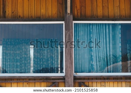 Outside view facade. Wooden yellow brown boards material,