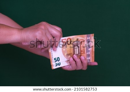 Closeup: Woman hands counting euro money