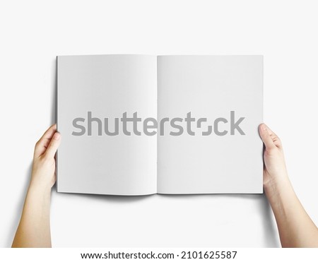 A4 Advertising Magazine Brochure Mockup 3D Rendering with Hand Royalty-Free Stock Photo #2101625587