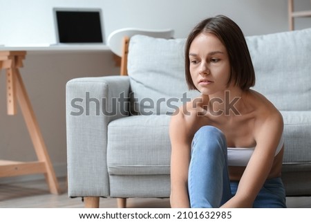 Young woman with anorexia at home Royalty-Free Stock Photo #2101632985