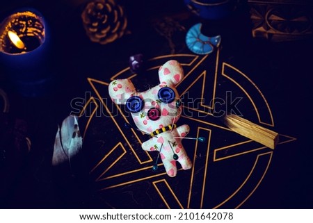 Magic handmade doll .Witchcraft with a doll. Concept of magic, voodoo