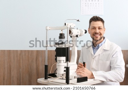 Portrait of male ophthalmologist in clinic Royalty-Free Stock Photo #2101650766