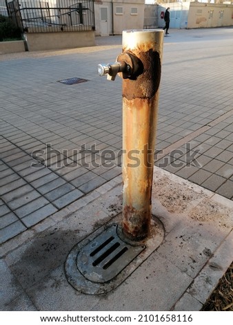 A fountain corroded by atmospheric agents near the sea