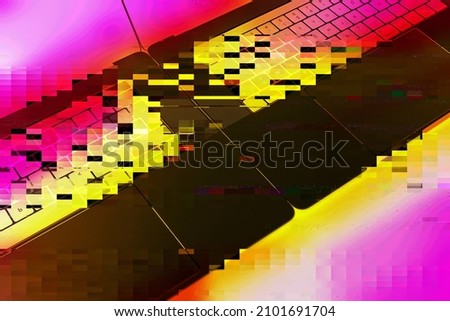 Two new professional modern laptops on the same table comparing - red yellow with metaverse digital concept