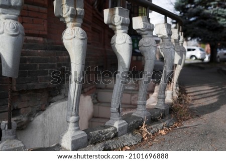 Old decorative balustrade . Aged and weathered architecture element 