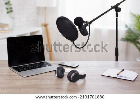 journalism, podcast and blogging concept - setup for recording podcast in home studio