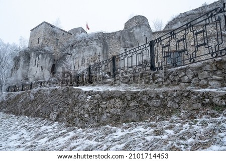 Bąkowiec Castle in Morsko built of stone on limestone rocks, winter