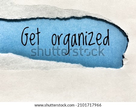 Get organized text on blue envelope.