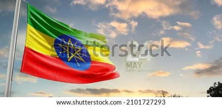 Ethiopia national flag cloth fabric waving on the sky with beautiful sky - Image