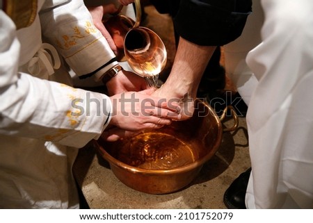 Maundy thursday celebration. Washing of the Feet. Roman Catholic church.  France.  Royalty-Free Stock Photo #2101752079
