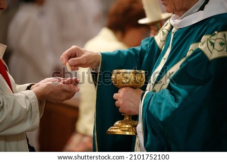 Catholic mass. Eucharist. Roman Catholic church.  France.  Royalty-Free Stock Photo #2101752100