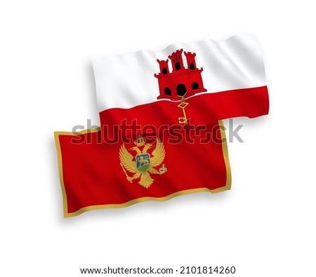 National vector fabric wave flags of Montenegro and Gibraltar isolated on white background. 1 to 2 proportion.