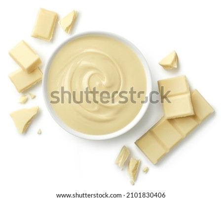 Bowl of melted white chocolate and broken pieces of chocolate bar isolated on white background Royalty-Free Stock Photo #2101830406