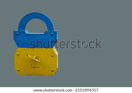 Barn lock figure is isolated on uniform background.The yellow-blue barn castle is giant in size