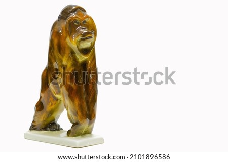 Swap meet. Gorilla figure. Clay glazed ceramics. Brown color