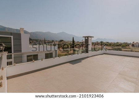 a large spacious terrace with a seating area, an open kitchen and a barbecue area, as well as sun loungers for relaxation with sea and Mountain View