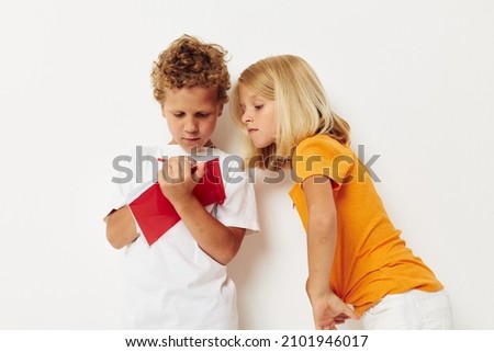 picture of positive boy and girl draw in the notebook childhood entertainment lifestyle unaltered