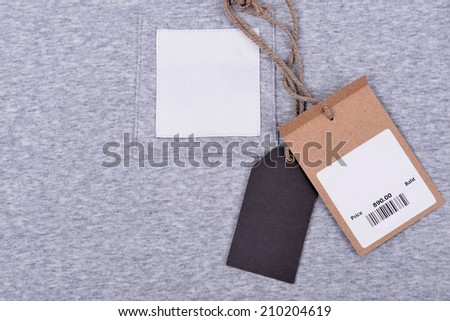 t shirt with price tag on white background