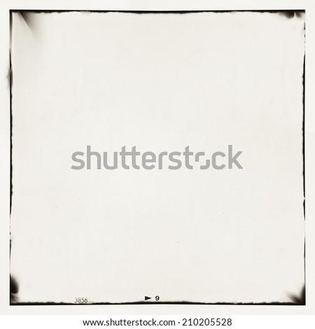 medium format film frame background. Texture contains grain, dust and light leaks