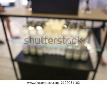blur abstract image of  shelves store inside modern shopping mall or shopping center.