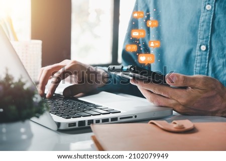 Man hand using smart phone on office desk with copy space, Social, media, Marketing concept.