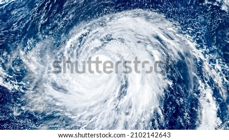 Spinning Super Typhoon Hagibis Aerial View Background Photo, Pacific Ocean, Category 5 Storm top view photo, Northern Mariana Islands, 16:9 ratio wallpaper. Elements of this image furnished by NASA Royalty-Free Stock Photo #2102142643