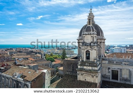 View over the cityscape of Catania on the island of Sicily in Italy with famous cathedral (Cattedrale di Sant'Agata) and harbour  Royalty-Free Stock Photo #2102213062