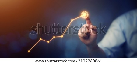 Targeting the business concept, Businessman touching business target on virtual screen, target in his hand Planning for success, Set goals for better results. Royalty-Free Stock Photo #2102260861