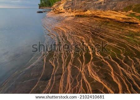 Landscape near sunset of the eroded sandstone shoreline at Miner's Beach, Lake Superior, Pictured Rocks National Lakeshore, Michigan's Upper Peninsula, USA