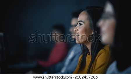 Diverse Multiethnic Group of Female and Male Students Sitting in College Room, Collaborating on School Projects on a Computer. Young Scholars Study, Talk, Apply Academic Skills and Knowledge in Class. Royalty-Free Stock Photo #2102457286