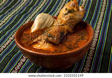 KAK'IK IS A TRADITIONAL GUATEMALAN DISH MADE AS A CALDO OF TURKEY, 
SPICES AND VEGETABLES Royalty-Free Stock Photo #2102501149
