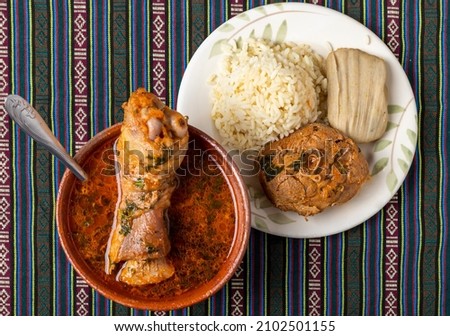 KAK'IK IS A TRADITIONAL GUATEMALAN DISH MADE AS A CALDO OF TURKEY, 
SPICES AND VEGETABLES Royalty-Free Stock Photo #2102501155