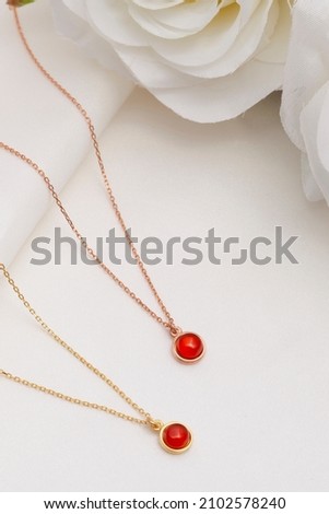 Carnelian necklaces on white background. Necklace image for e commerce, social media.