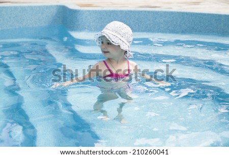 Toddler in a swimming pool