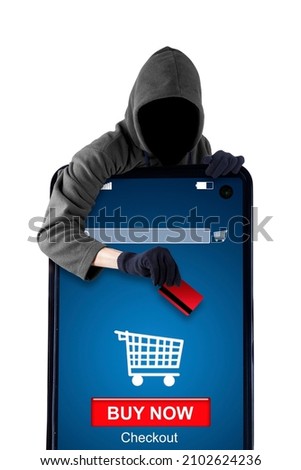 Picture of male hacker stealing a credit card while hacking shopping online app on the cellphone