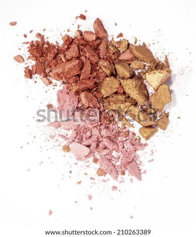 pink, red and golden eyeshadow isolated on white background