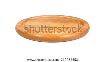 Multifunctional circular wooden cutting board isolated on white background with clipping path used for cutting bread, pizza or steak serve