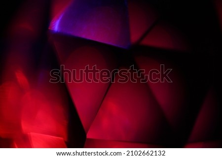 Blurred triangle background abstract. Dark color triangel backdorp.