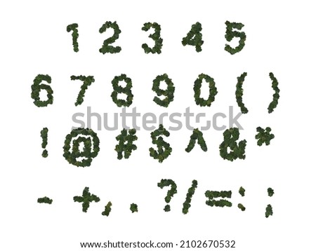 Forest stylized font, numbers and symbols. Made with treetops isolated on a white background.