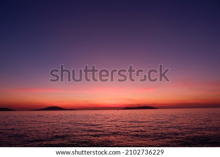 amazing landscape view after sunset with sea and island