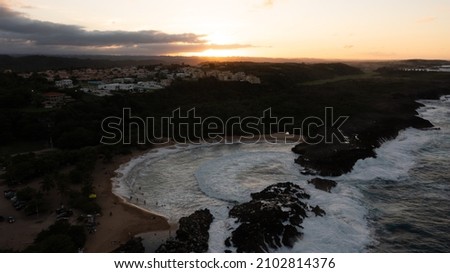 A beautiful aerial picture of a beach with a form of a shell during sunset - Mar Chiquita
