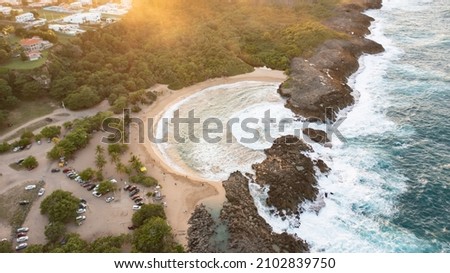 A beautiful aerial picture of a beach with a form of a shell during sunset - Mar Chiquita