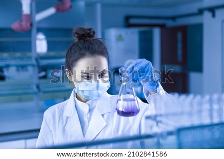 Female scientist working in the laboratory. Royalty-Free Stock Photo #2102841586