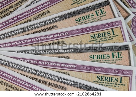 US Savings Bonds. Savings bonds are debt securities issued by the U.S. Department of the Treasury. They are issued in Series EE or Series I. Royalty-Free Stock Photo #2102864281