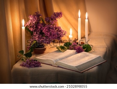 Rustic pray psalm letter torah law education table space card. Holy hebrew age jew home culture god Jesus Christ literary gospel purple evening night art still life flame fire symbol concept backdrop Royalty-Free Stock Photo #2102898055