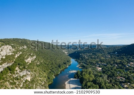 The Ardeche river in the middle of the Ardeche countryside in Europe, France, Ardeche, in summer, on a sunny day.