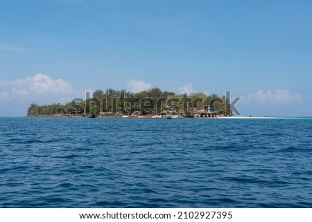 Small island on the coast of Zanzibar known as Prison island or Changuu Island called by the locals. Small paradise island where the tourist go to see giant turtles.