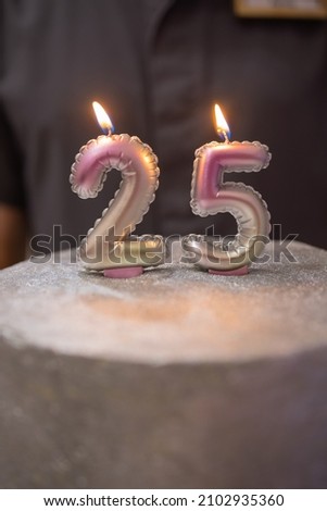 cake with a number twenty-five on top.Birthday, anniversary.