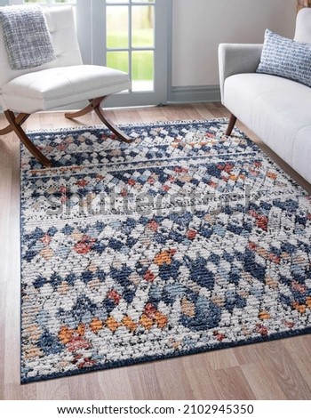 Modern geometric living area rug texture design. Royalty-Free Stock Photo #2102945350